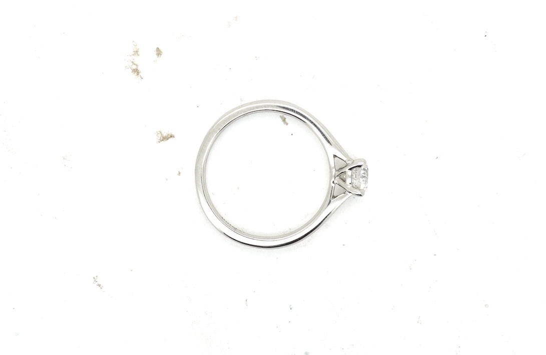 A diamond ring, claw-set with a brilliant-cut diamond weighing approximately 0.55 carats, mounted in platinum, size L1/2, British hallmarks, gross weight approximately 4 grams